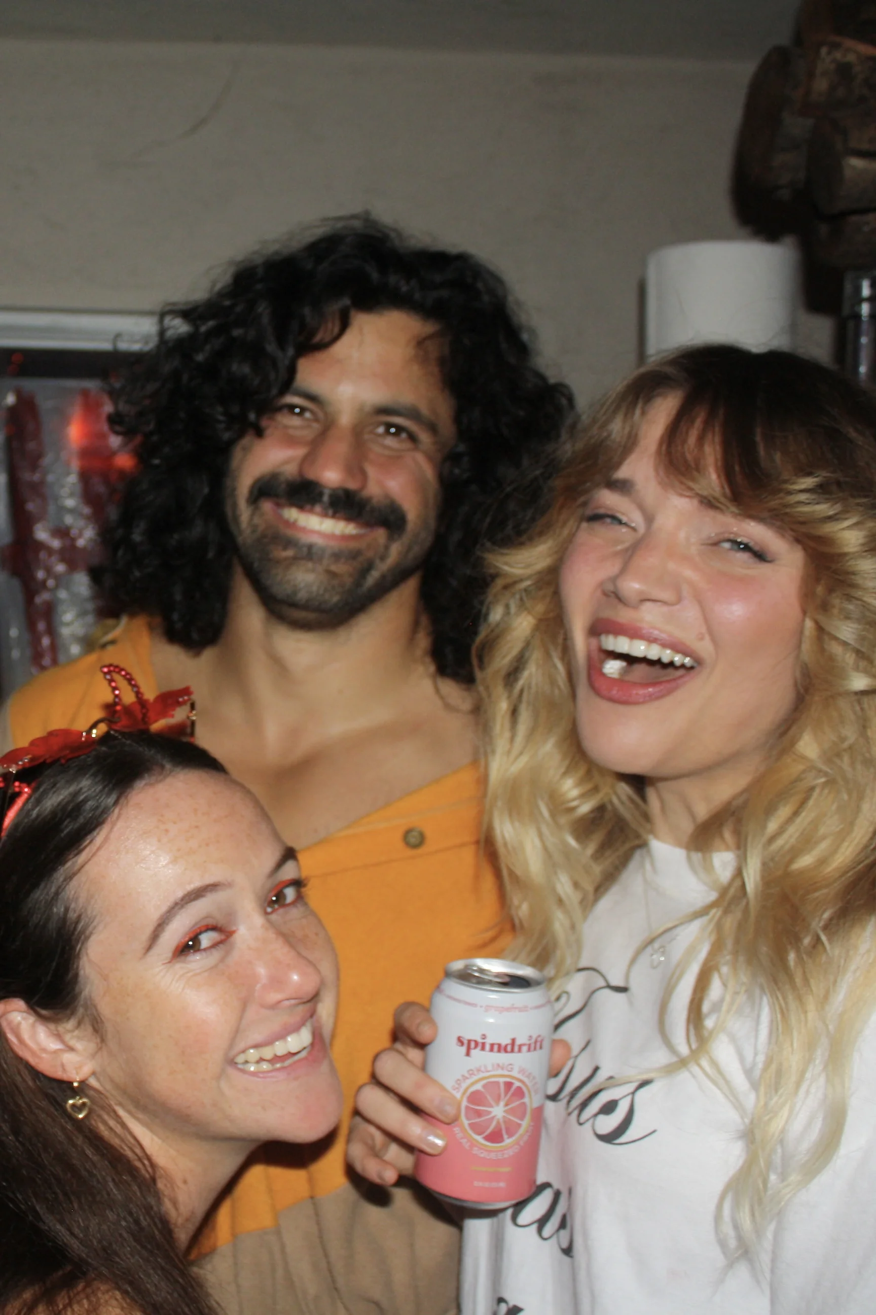 Aidan laughing with friends at Halloween 2024